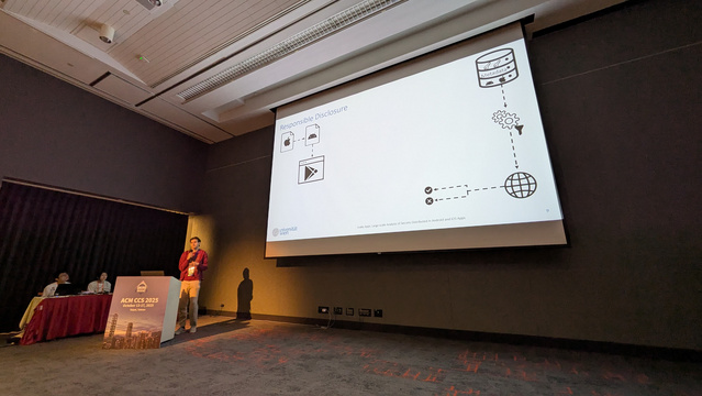 David Schmidt standing at a podium giving a presentation.